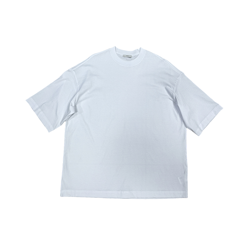 How did the crew neck t-shirt become a versatile staple in knitwear with its minimalist design and flexible customization?